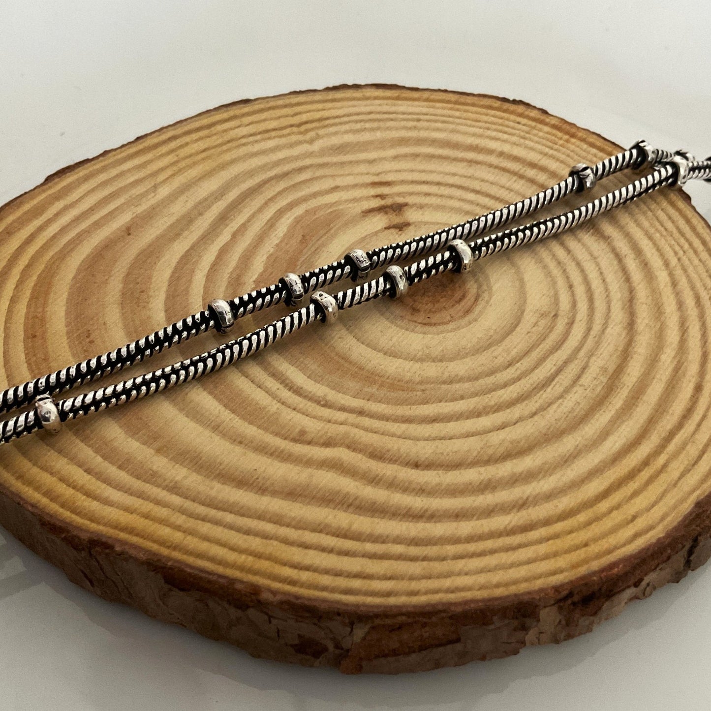 Kirthi silver pair of anklets (set of 2)