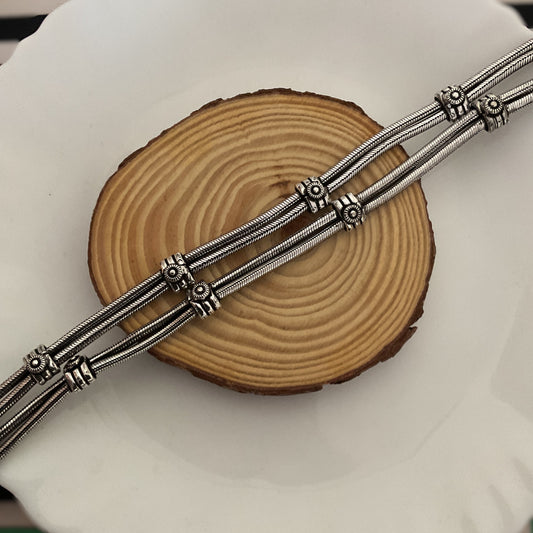 Tvarika double layer silver plated pair of anklet