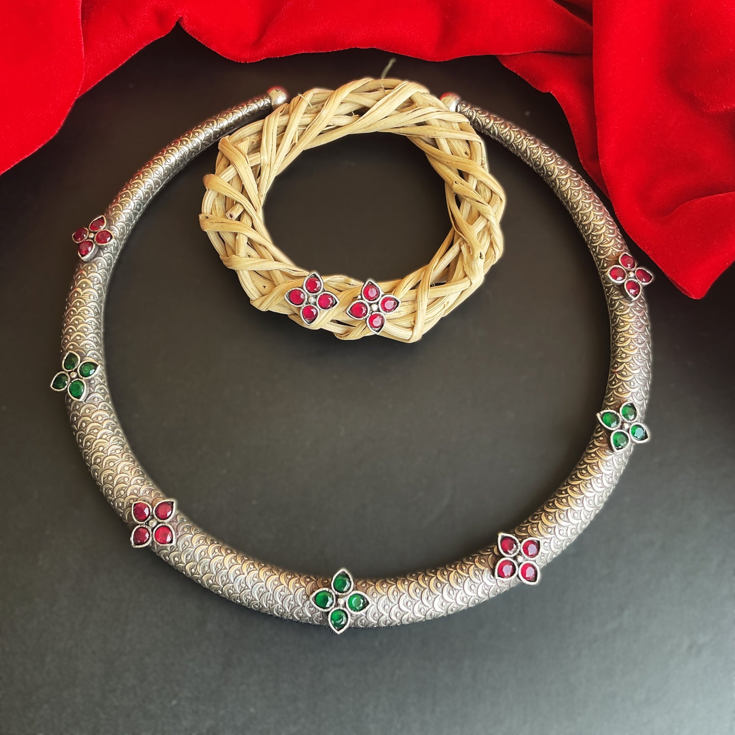 Kripika red and green flower motifs handcarved silver plated hasuli necklace
