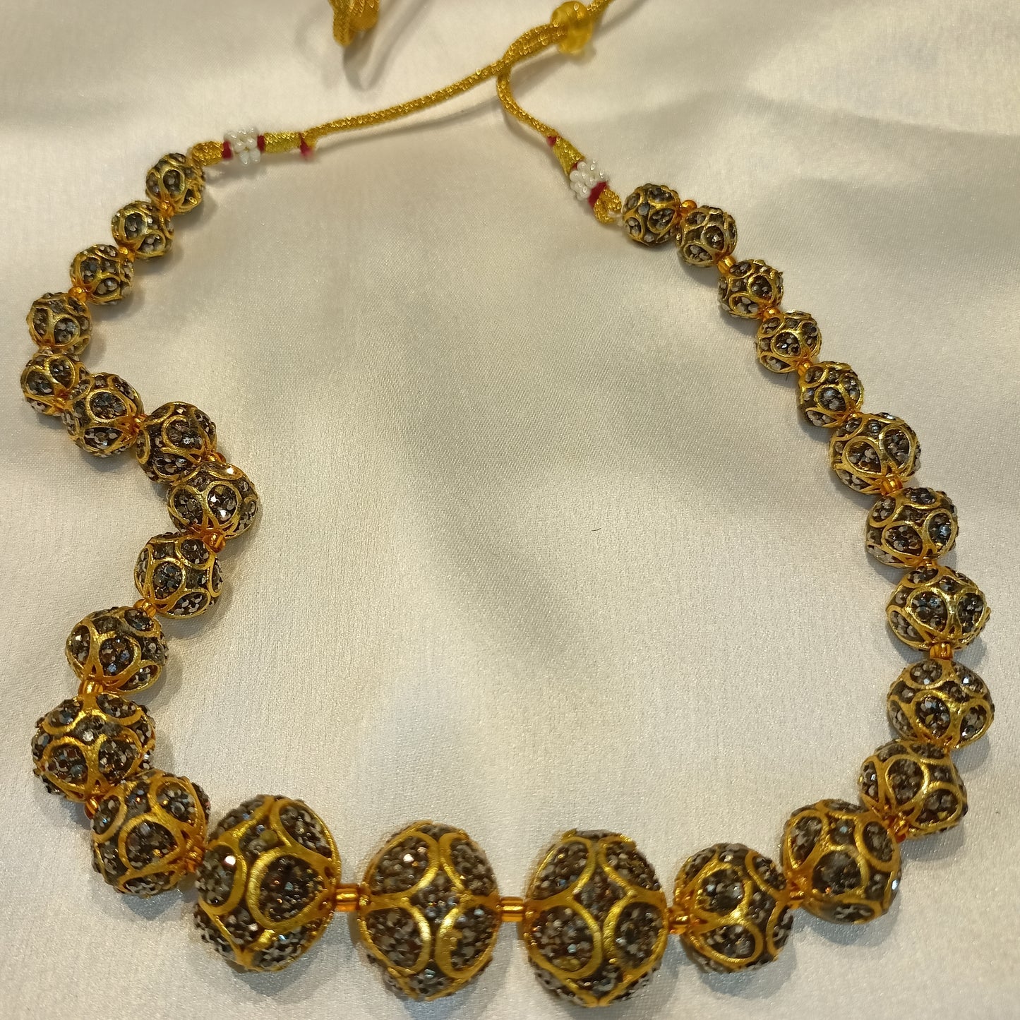 Akhila golden beads neck mala