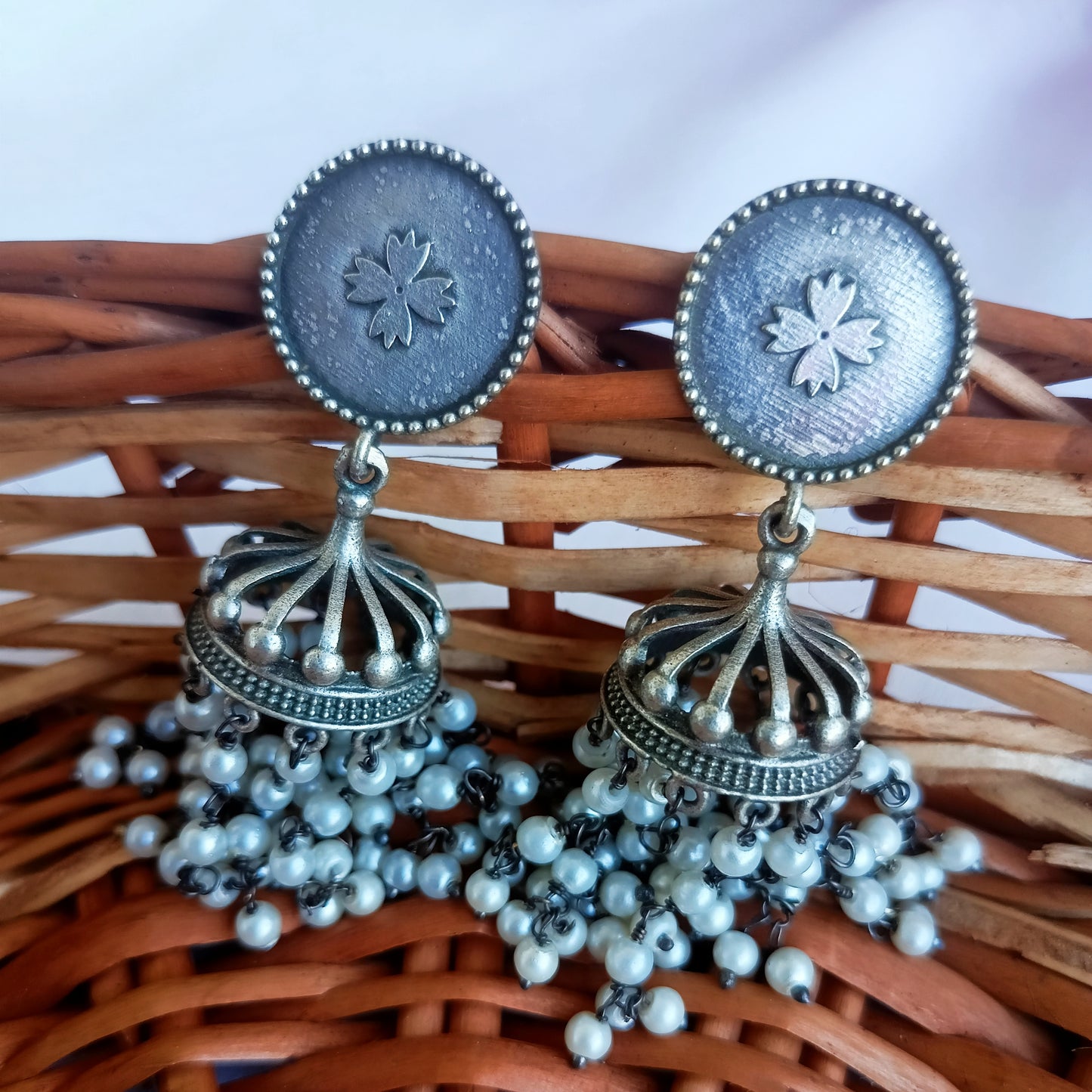 Zaara silver plated pearl jhumkis earrings