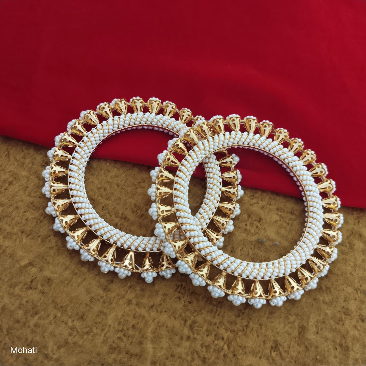 Rupanjana pearl jadau flower shaped pair of bangles set