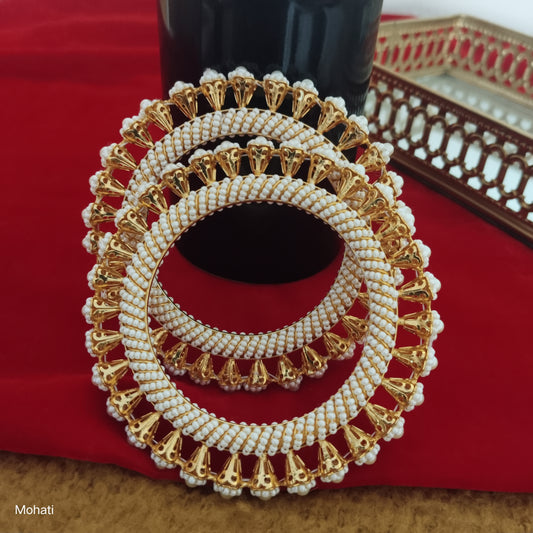 Rupanjana pearl jadau flower shaped pair of bangles set