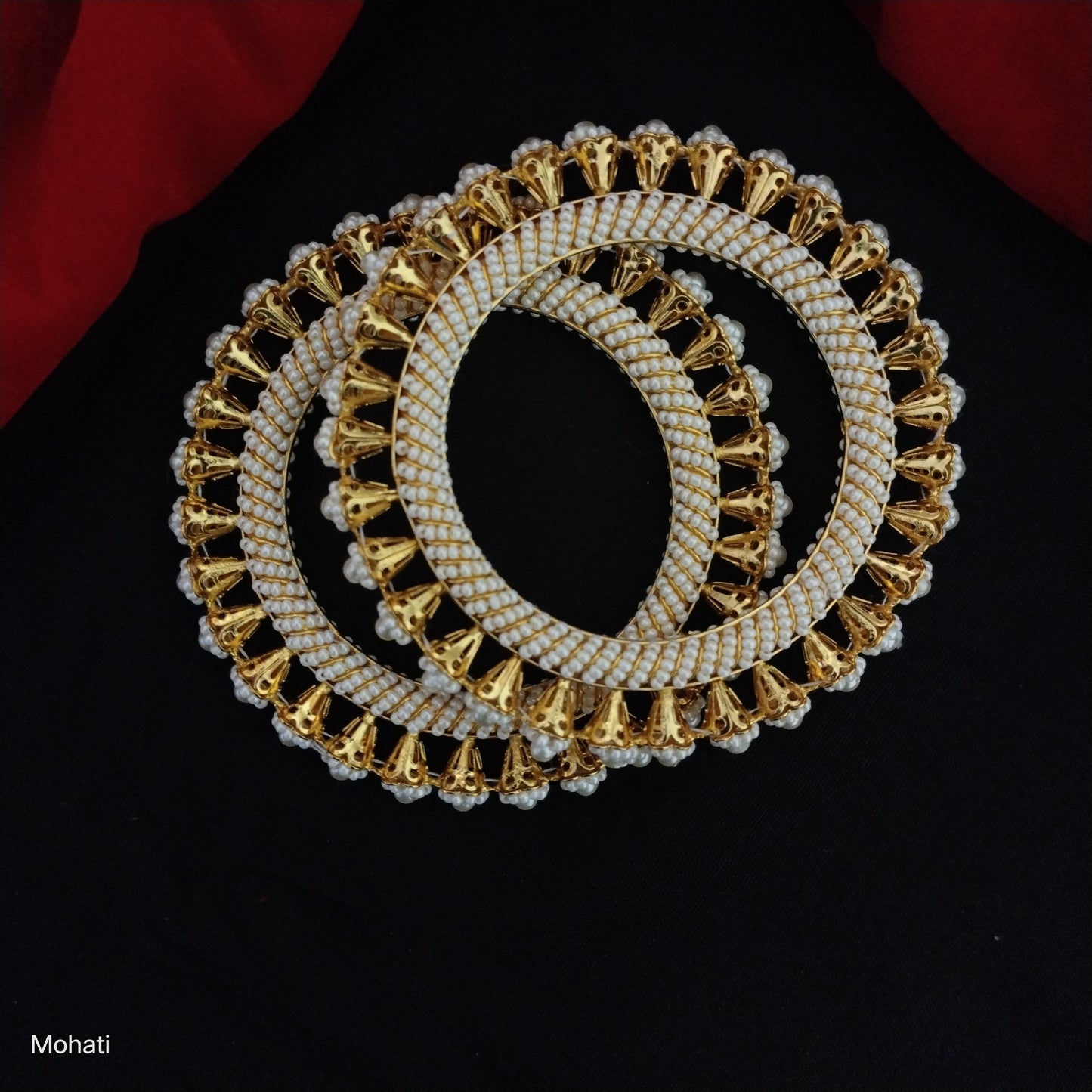 Rupanjana pearl jadau flower shaped pair of bangles set