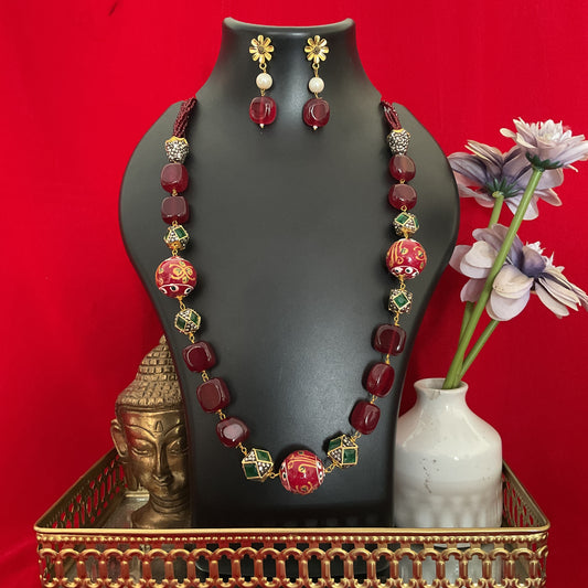 Aarya maroon hand painted beads stone gold plated neck mala with earrings