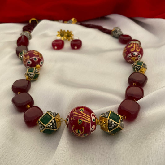 Aarya maroon hand painted beads stone gold plated neck mala with earrings