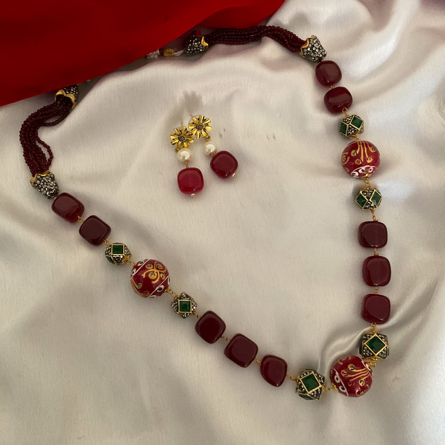 Aarya maroon hand painted beads stone gold plated neck mala with earrings