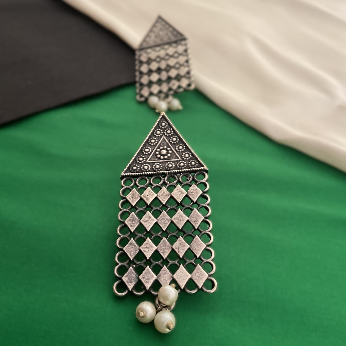 Ekisha silver plated long jaali handmade earrings