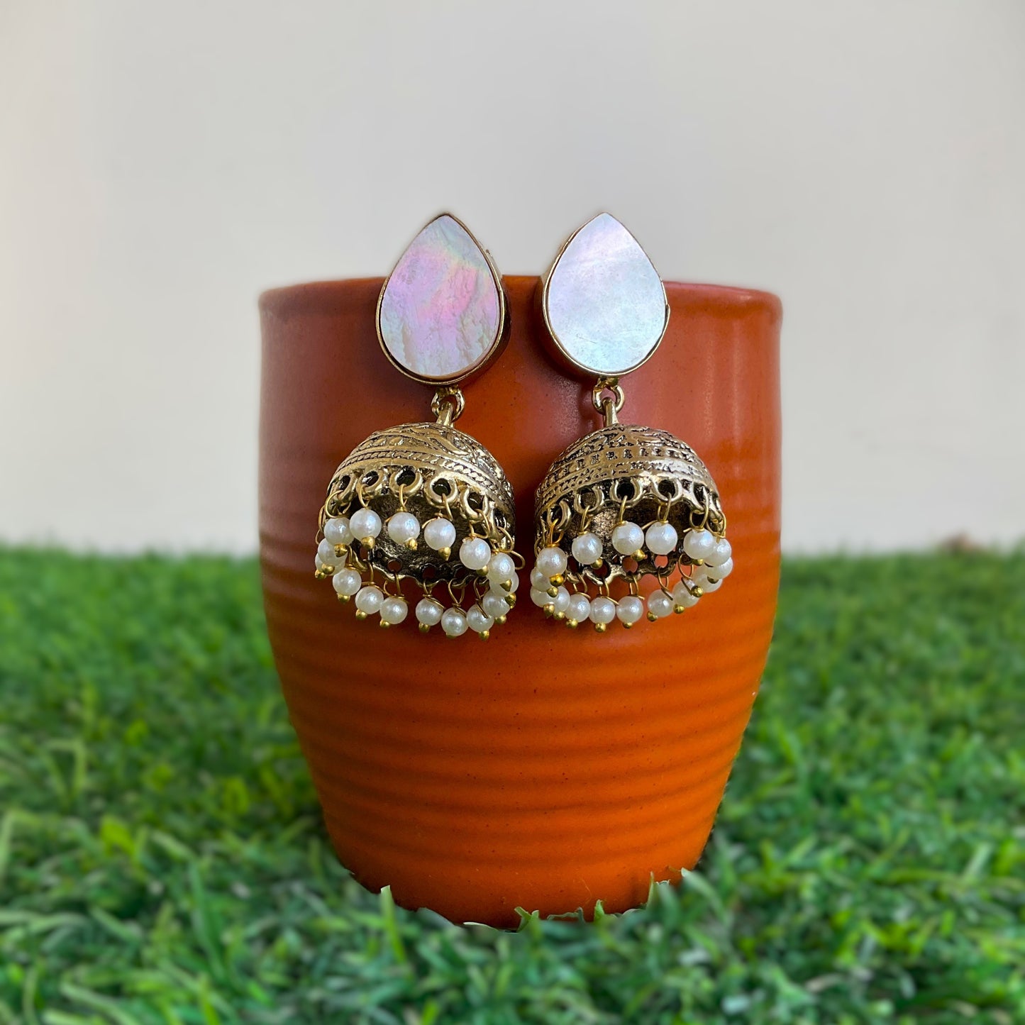 Tisca natural mop antique gold plated small jhumkis