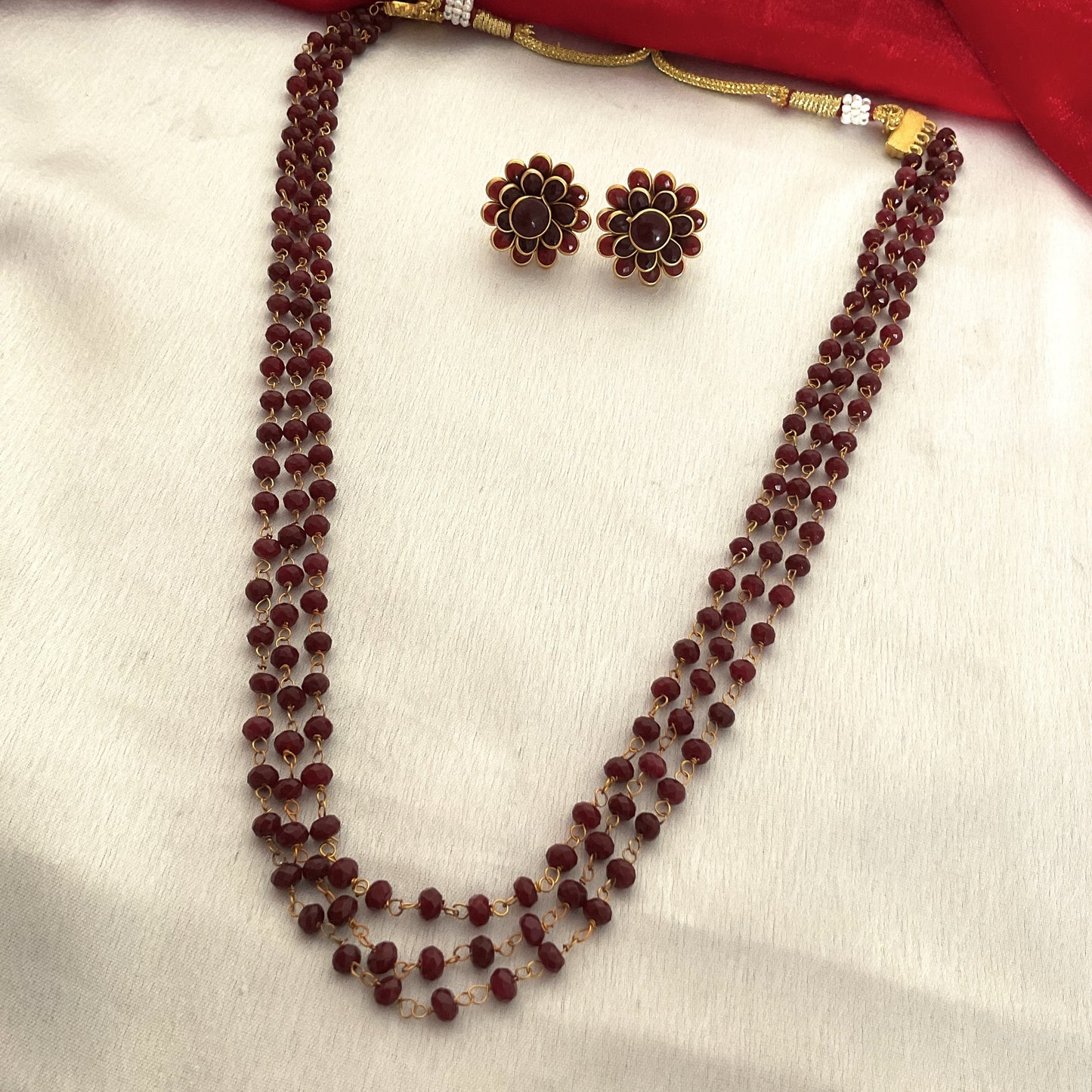 Gaurangi maroon jade 3 layer mala with studs