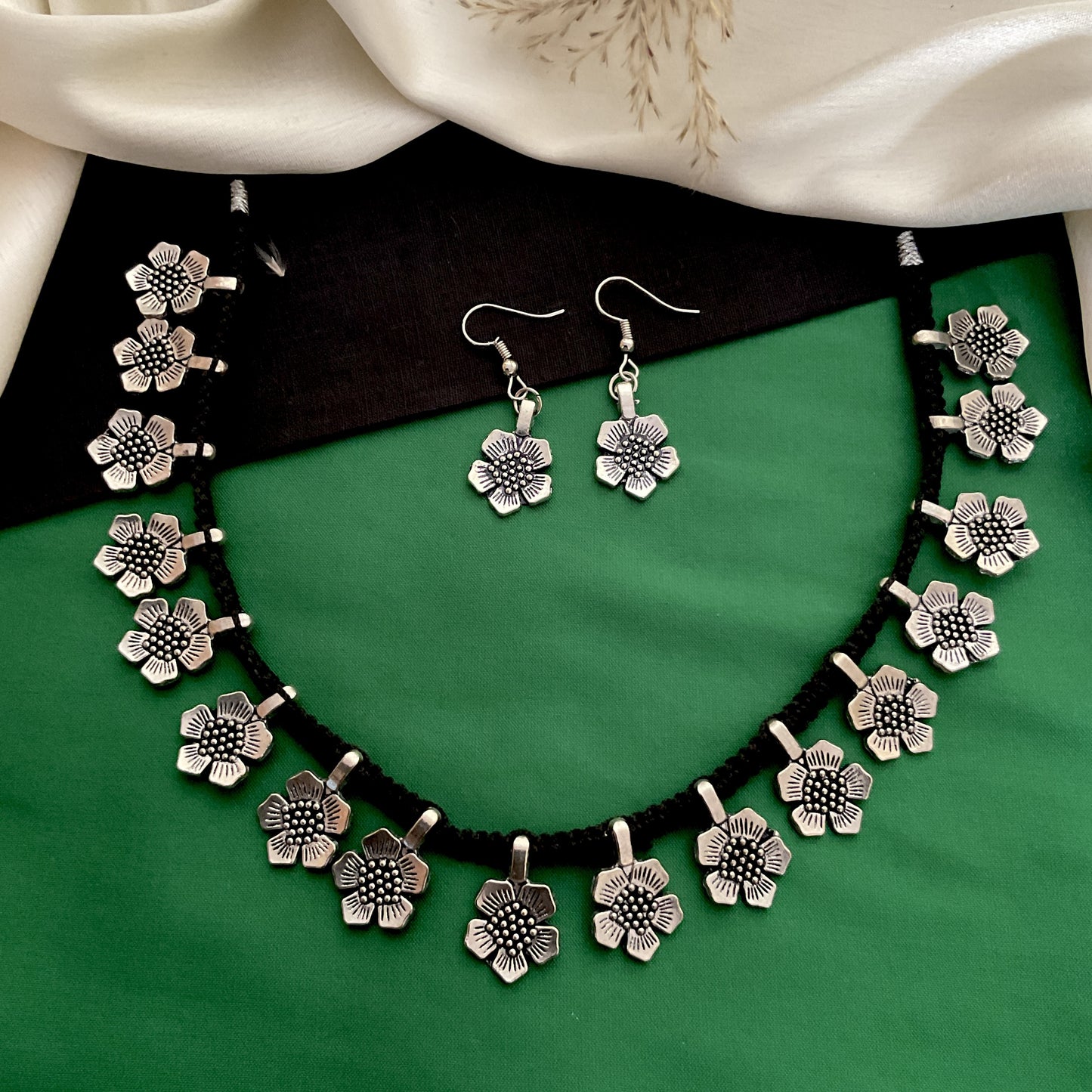 Dhara oxidized flower thread necklace