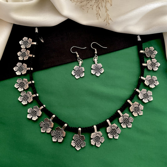Dhara oxidized flower thread necklace