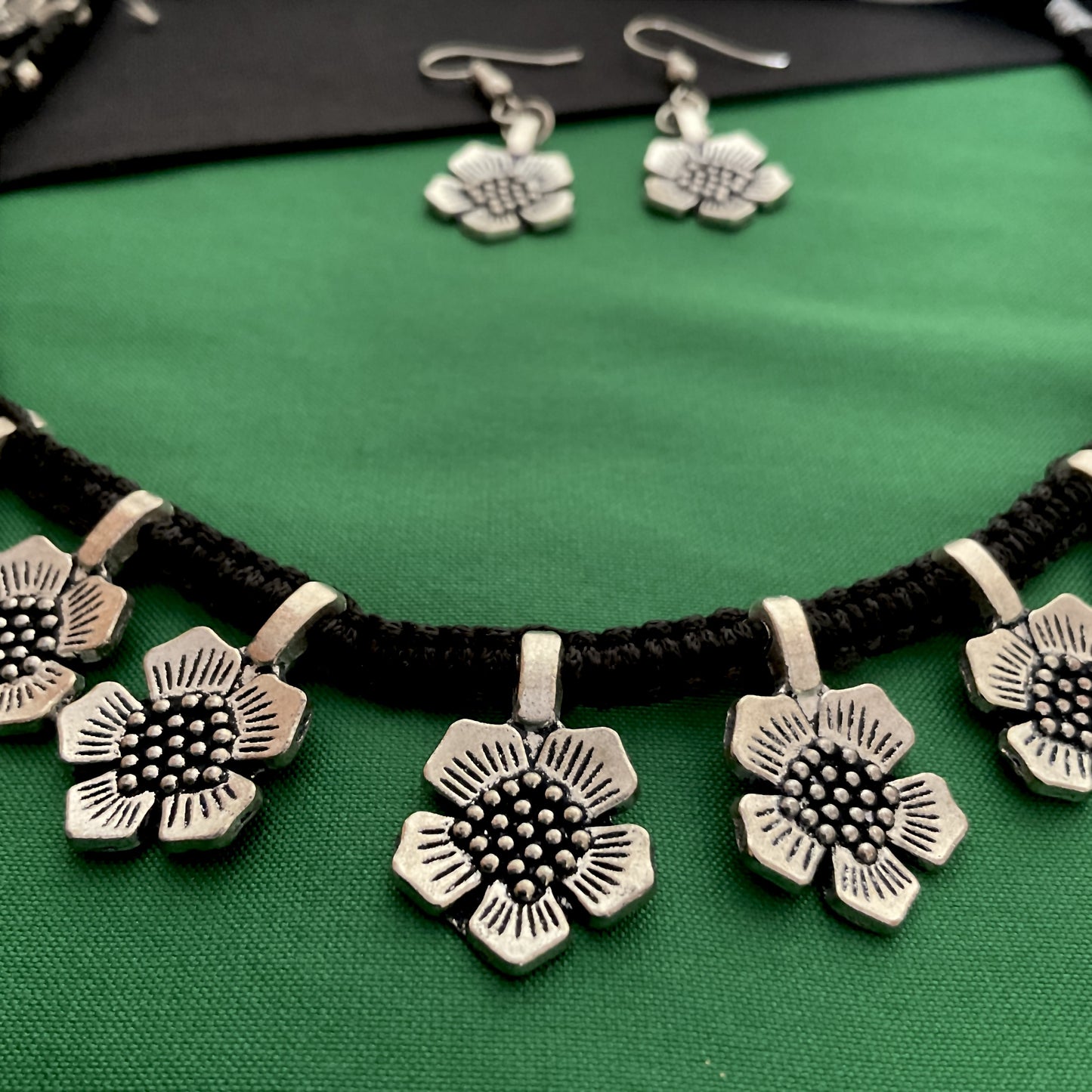 Dhara oxidized flower thread necklace
