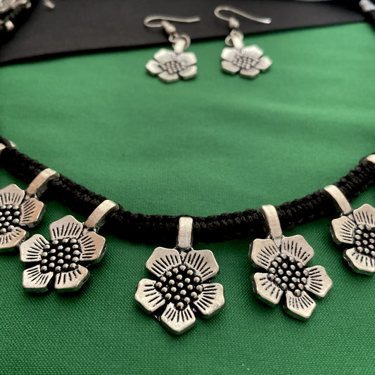 Dhara oxidized flower thread necklace